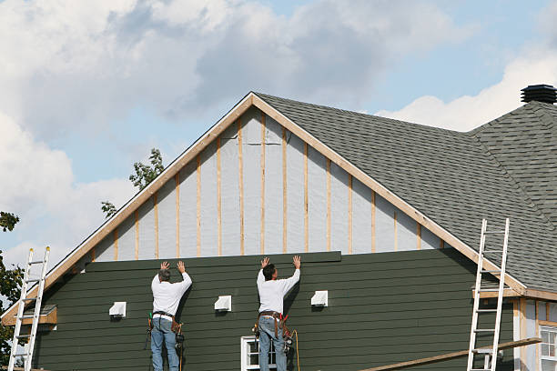 Professional Emergency Siding Repair technician working in Bloomfield, NY